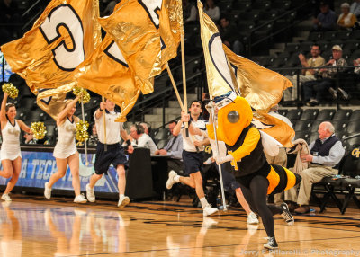 Yellow Jackets Mascot Buzz brings the flags out before tipoff
