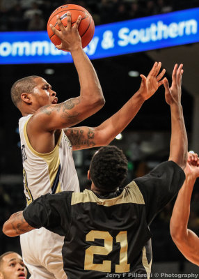 Georgia Tech F Marcus Georges-Hunt takes a short jump shot over Alabama State PG Denzell McDaniel