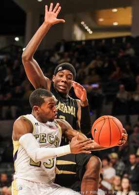 Georgia Tech G Reed scoops a shot and is fouled by an Alabama State defender