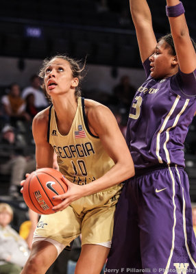 Georgia Tech F Hamilton-Carter looks to the basket as Washington F Walton defends