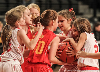 Jump Ball; two girls squads square off at halftime