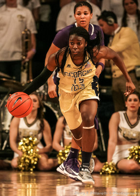Yellow Jackets G Marshall brings the ball up court after securing a rebound