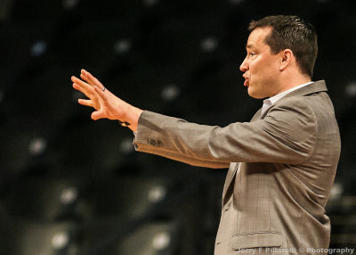 Washington Head Coach Kevin McGuff instructs his team from the sidelines