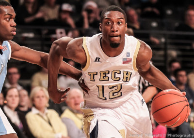 Georgia Tech G Stacey Poole Jr. moves past a Citadel defender