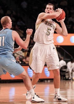 Jackets C Miller looks to pass over Citadel C Groselle