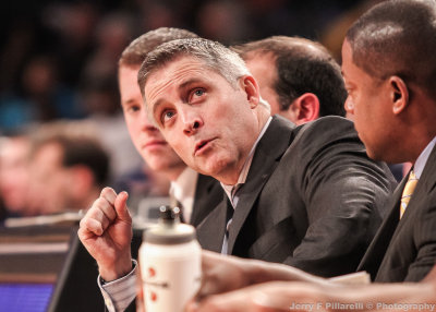 Georgia Tech Yellow Jackets Head Coach Brian Gregory checks the clock during play