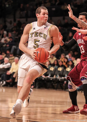 Georgia Tech C Miller drives around the right side