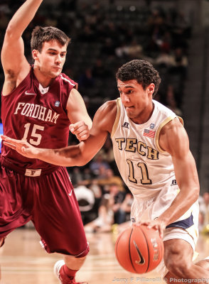 Georgia Tech G Bolden drives around Fordham G Nihad Musovic