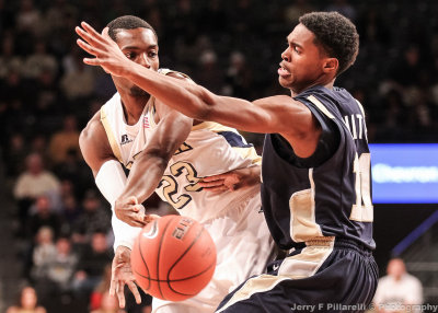 Georgia Tech G Brandon Reed passes around Chattanooga G White