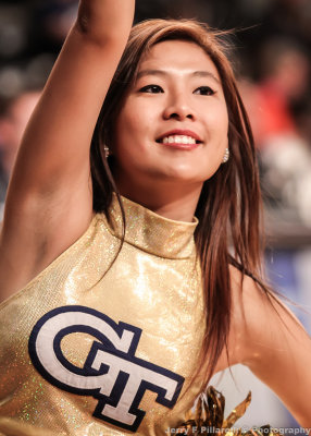 Georgia Tech Dance Team Member leads the crowd during a timeout 