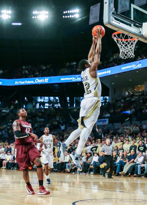 Yellow Jackets G Stacey Poole Jr. dunks on a break away