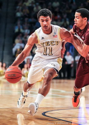 Tech G Chris Bolden drives around a Hokies defender