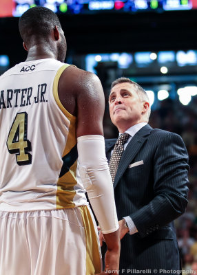 Georgia Tech Yellow Jackets Head Coach Brian Gregory works with F Robert Carter Jr.