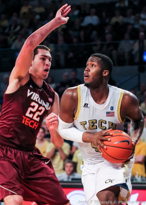 Georgia Tech F Robert Carter Jr. goes along the baseline against Virginia Tech F Christian Beyer