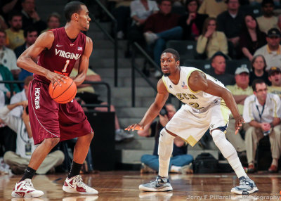 Jackets G Stacey Poole defends against Hokies G Brown