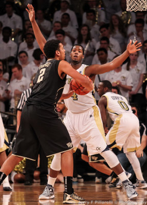 Georgia Tech F Robert Carter Jr. gets in front of Wake Forest F Devin Thomas