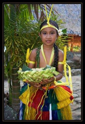 Young Yapese girl offering us fruit