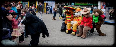 Mascots playing musical chairs