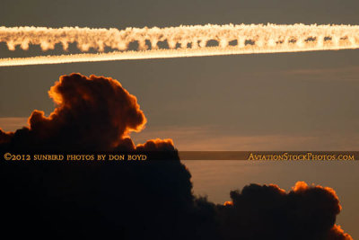 2012 - Contrails left across South Florida's western sky after sunset aviation stock photo #2458