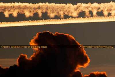 2012 - Contrails left across South Florida's western sky after sunset aviation stock photo #2458C