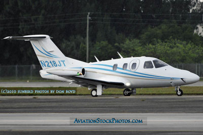 John Travolta arriving at Opa-locka Executive Airport in his Eclipse 500 N218JT