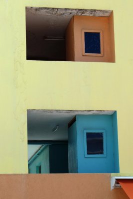 A colorful apartment building by Heritage Quay