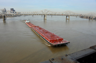 Oil barge heading up the Ohio river at Louisville, Kentucky (Indiana on the right)