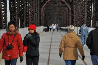 Walkers enjoying the bridge on a chilly morning