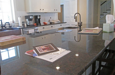 Island in Kitchen with Granite Countertop