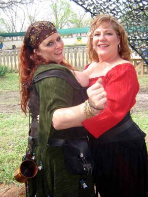 Stella and Susan enjoyed the wine are are now dancing.  If they could decide who will lead.