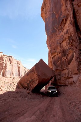 My van passing under the fallen rock in Long Canyon.