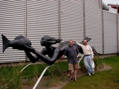 Greg and Andre sexually harrassing the mermaid statue