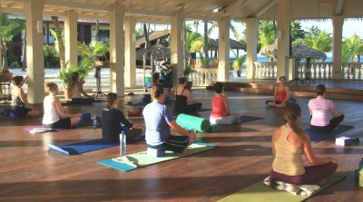 Gretchen is teaching yoga in Paradise