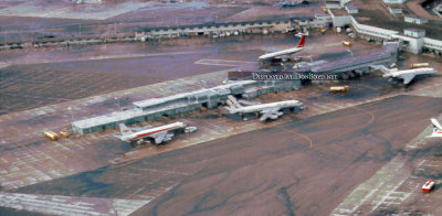 1964 - aerial view of Concourses 2 (now G) and 3 (now F) at Miami International Airport