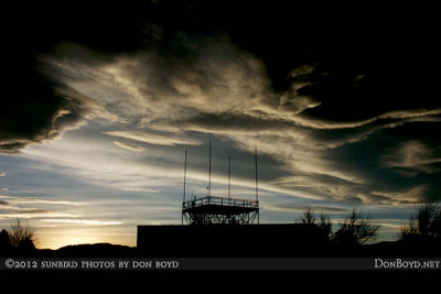 November 2012 - dark sunset skies behind the Peterson AFB antenna structure