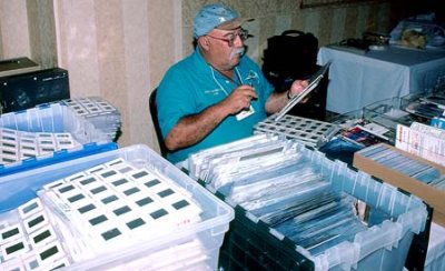2002 - Eddy Gual, the Slide Czar, at his table at the Airliners International show in Houston
