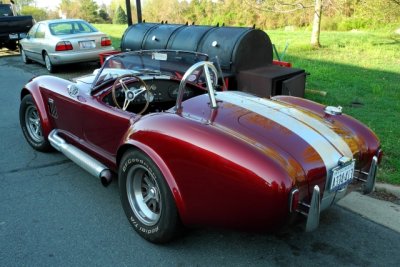 I think this is a continuation 1965 Shelby Cobra from Shelby American, although a very good one, and not an original. (7113)