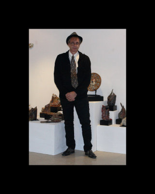 Me and some of my clay sculpture.jpg