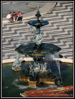 baroque fountain on Praça Dom Pedro IV