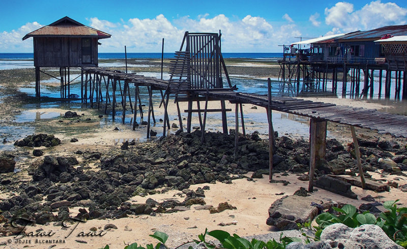 Sama house on stilts with gate