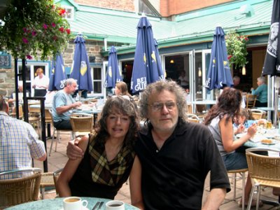 Judy and Richard - breakfast on the patio of La Petit Chateau on Rue St. Louis. Local French cooking - wonderful crepes.
