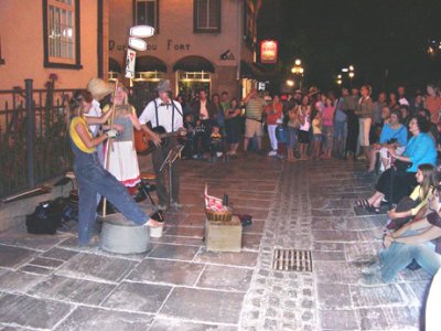 Street performers on Ste-Anne at night - in the Upper Town (Haute-Ville) section of Old Qubec.