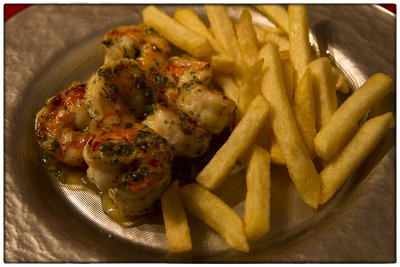 Frietjes met Scampi in knoflookboter