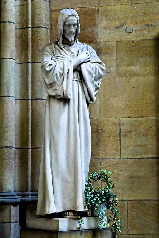 Statue beside the entrance to the side tower