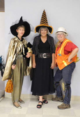 Construction worker with witches