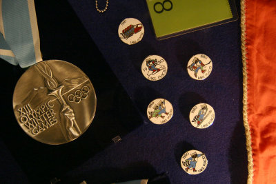 1980 Olympic Medal (silver?) and souvenir pins from the Lake Placid Olympic Winter Games.