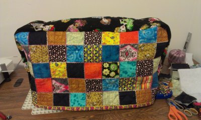 A patchwork cover for my new machine. If I ever made you a bag, spot your square!