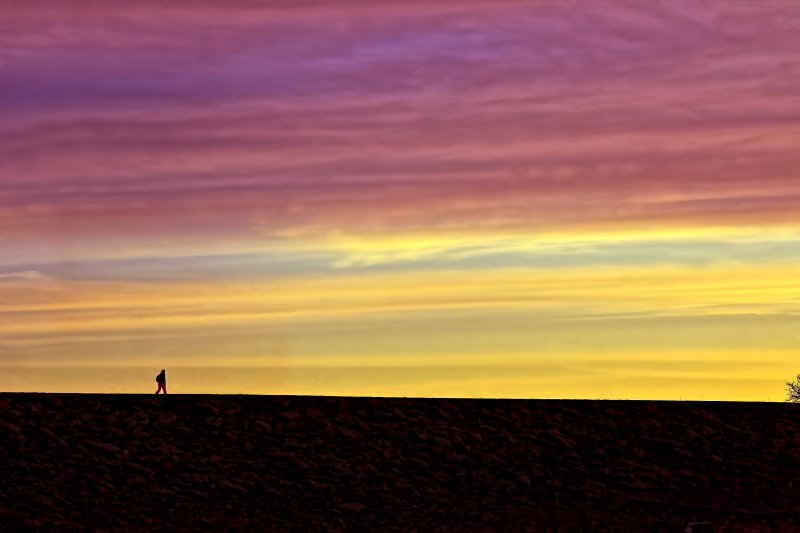 SMALL AGAINST THE SKY