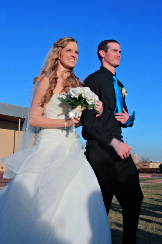 JASON WALKS HIS SISTER DOWN THE AISLE