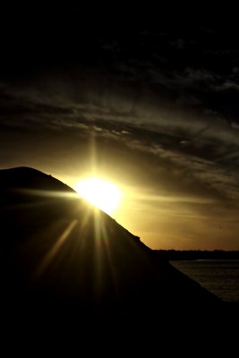 SUN AND A DIRT HILL